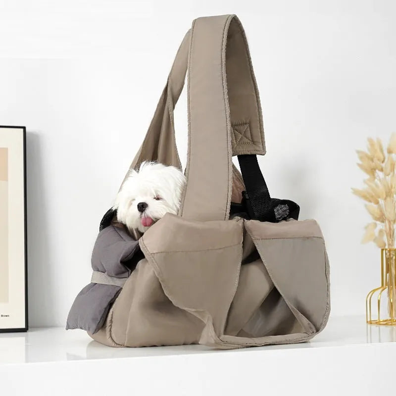 Apricot coloured cloth pet carrier handbag showing breathable fabric and portable design