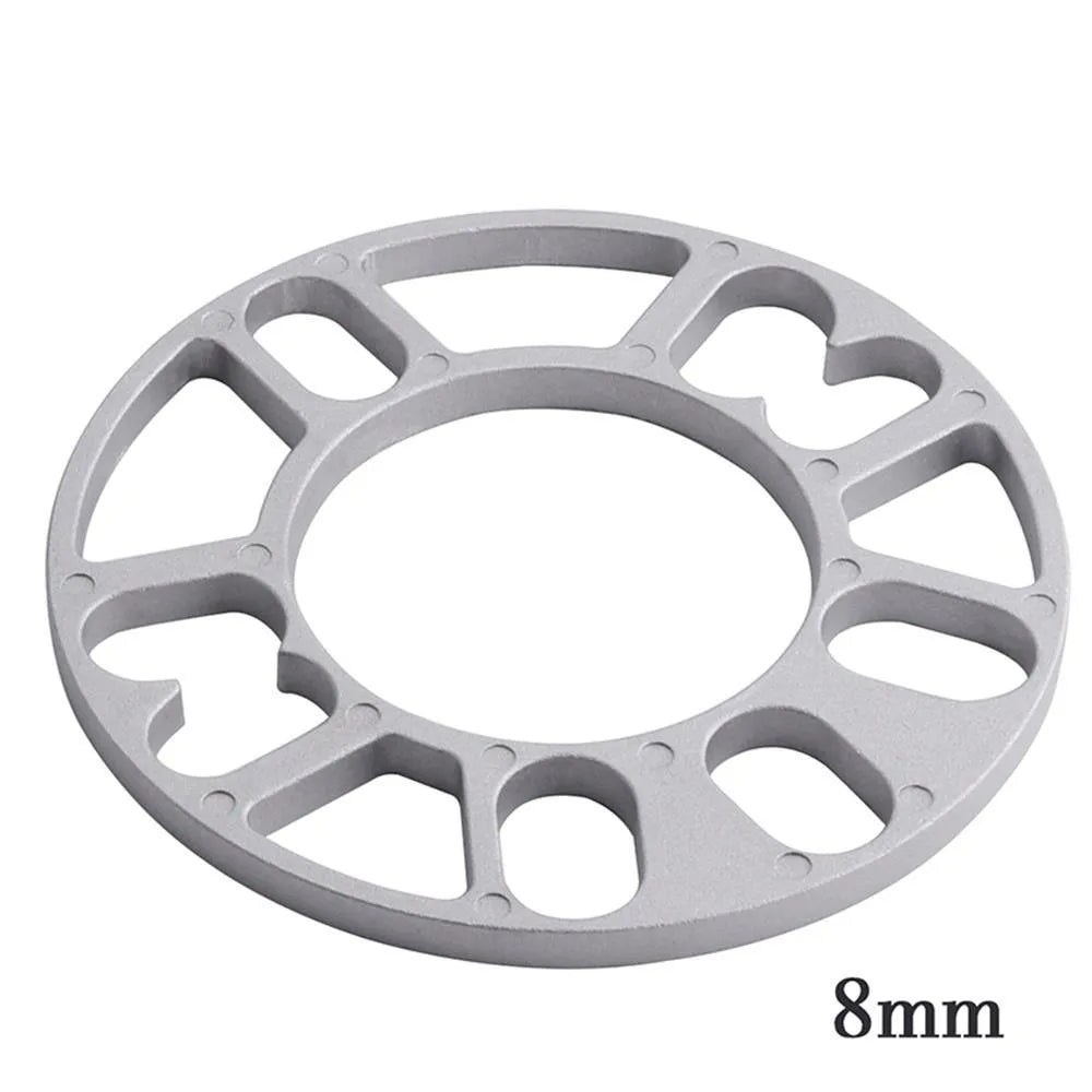Automotive wheel hub widening gasket spacer in various thicknesses for brake clearance.