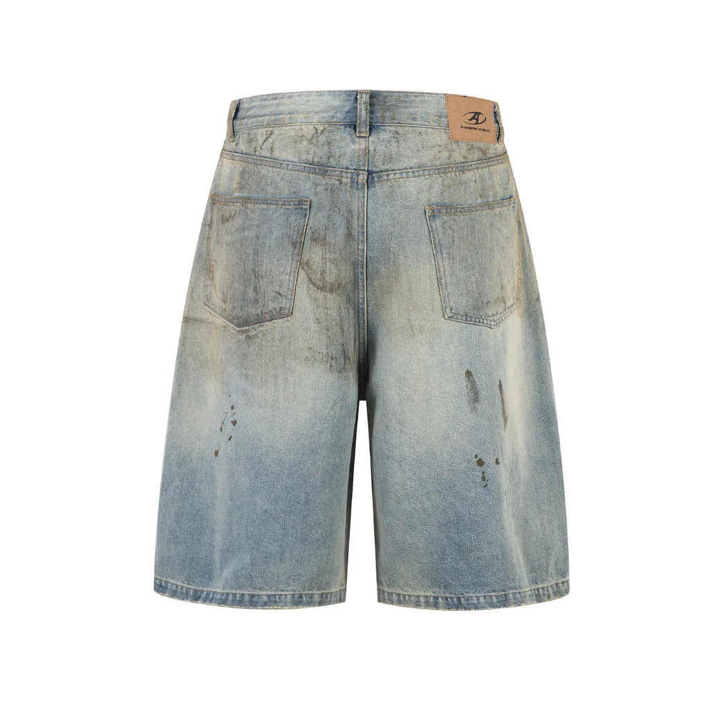 Blue washed denim cropped middle pants with straight leg and zipper fly on a model.