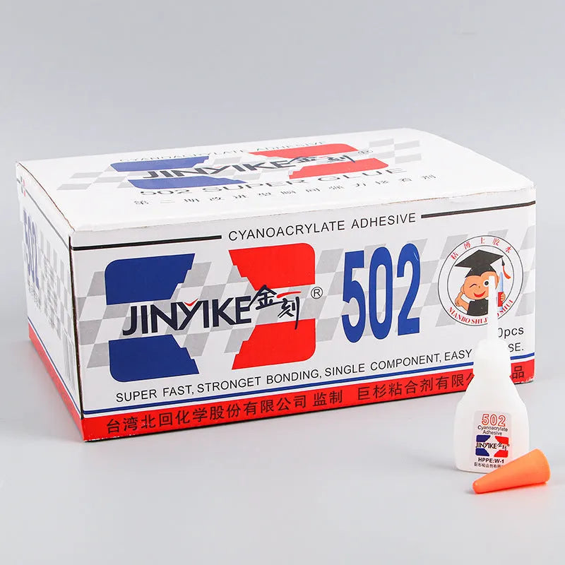 Instant strong shoe repair adhesive in 3G and 8G sizes with application tool