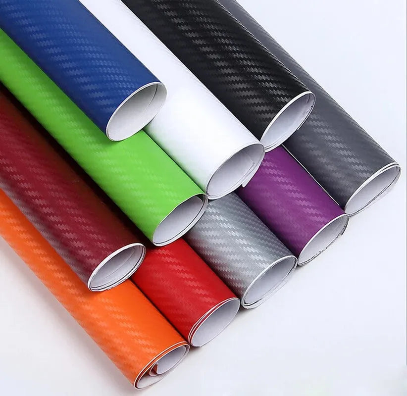 Roll of 3D carbon fibre patterned car sticker in one of eight colours, showing textured black and silver weave design