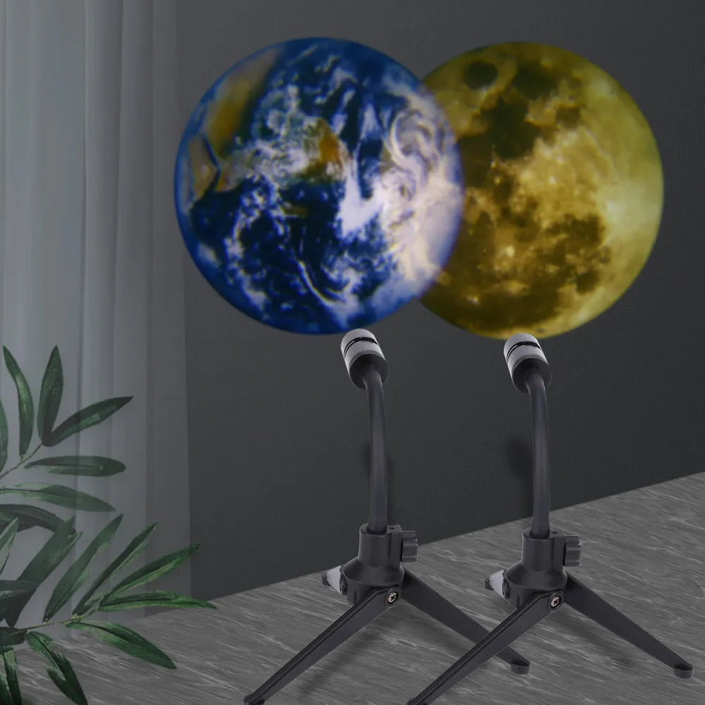 Earth and moon projection lamp with adjustable hose bracket on wooden surface