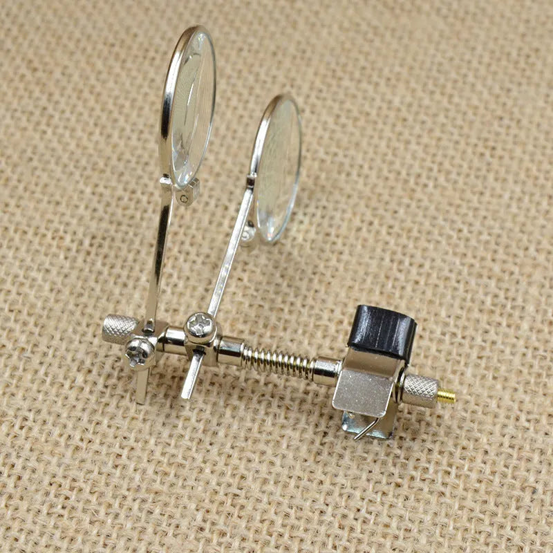 Auxiliary reading glasses double clip with a metal bracket and glass lens.