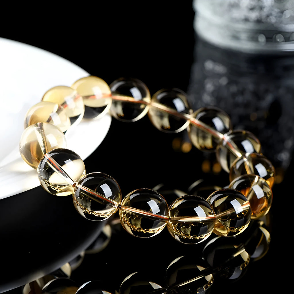 Natural citrine scattered bead and ball bracelet shown in selectable 7A or 6A grade colour.