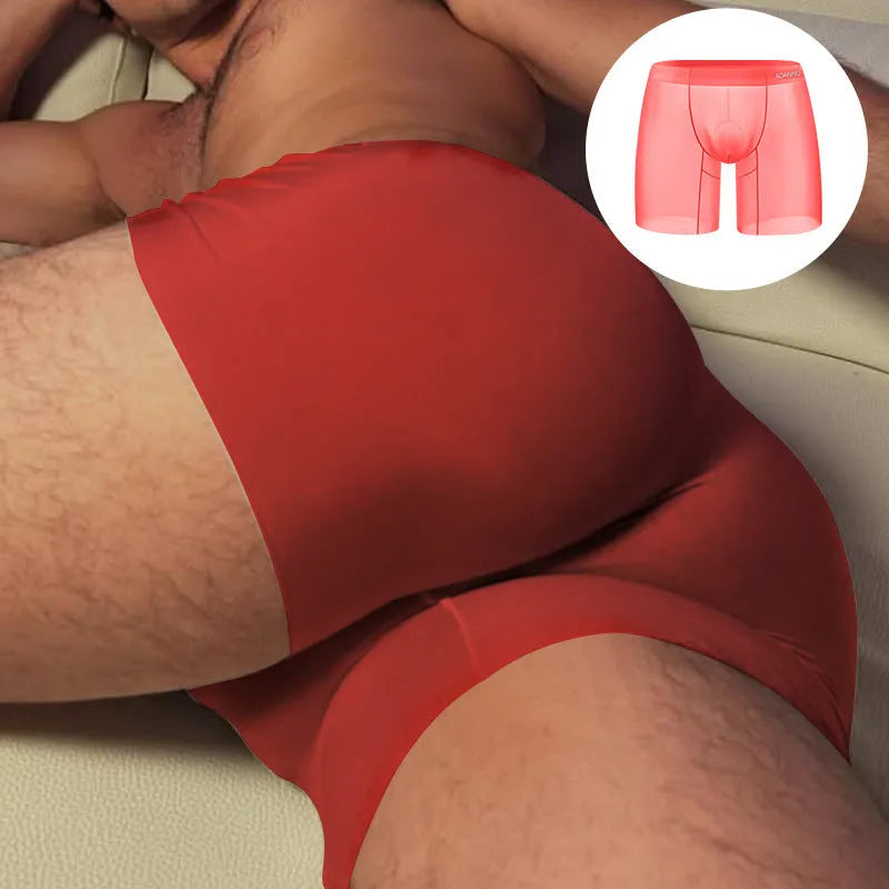 Men's seamless sports boxer briefs in orange, pink, or red, showing low-rise waist and short-length design.