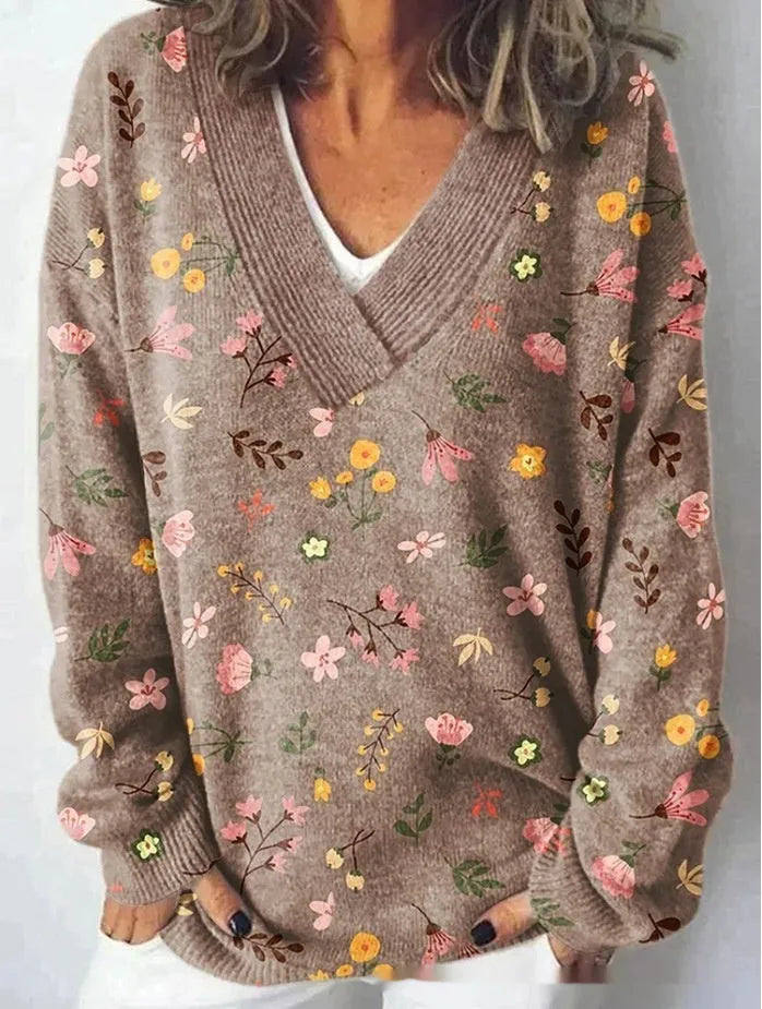 Women's V-neck floral print sweatshirt with long sleeves in wool woven fabric.
