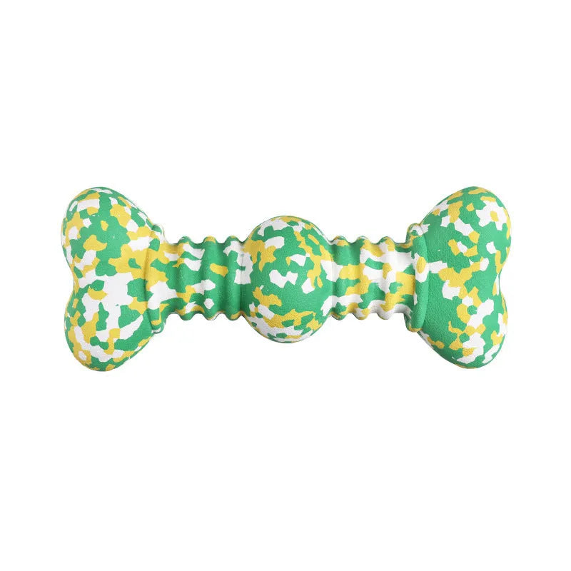 Green, white, and yellow camouflage pattern natural rubber bone chew toy for large breed dogs on a plain background.