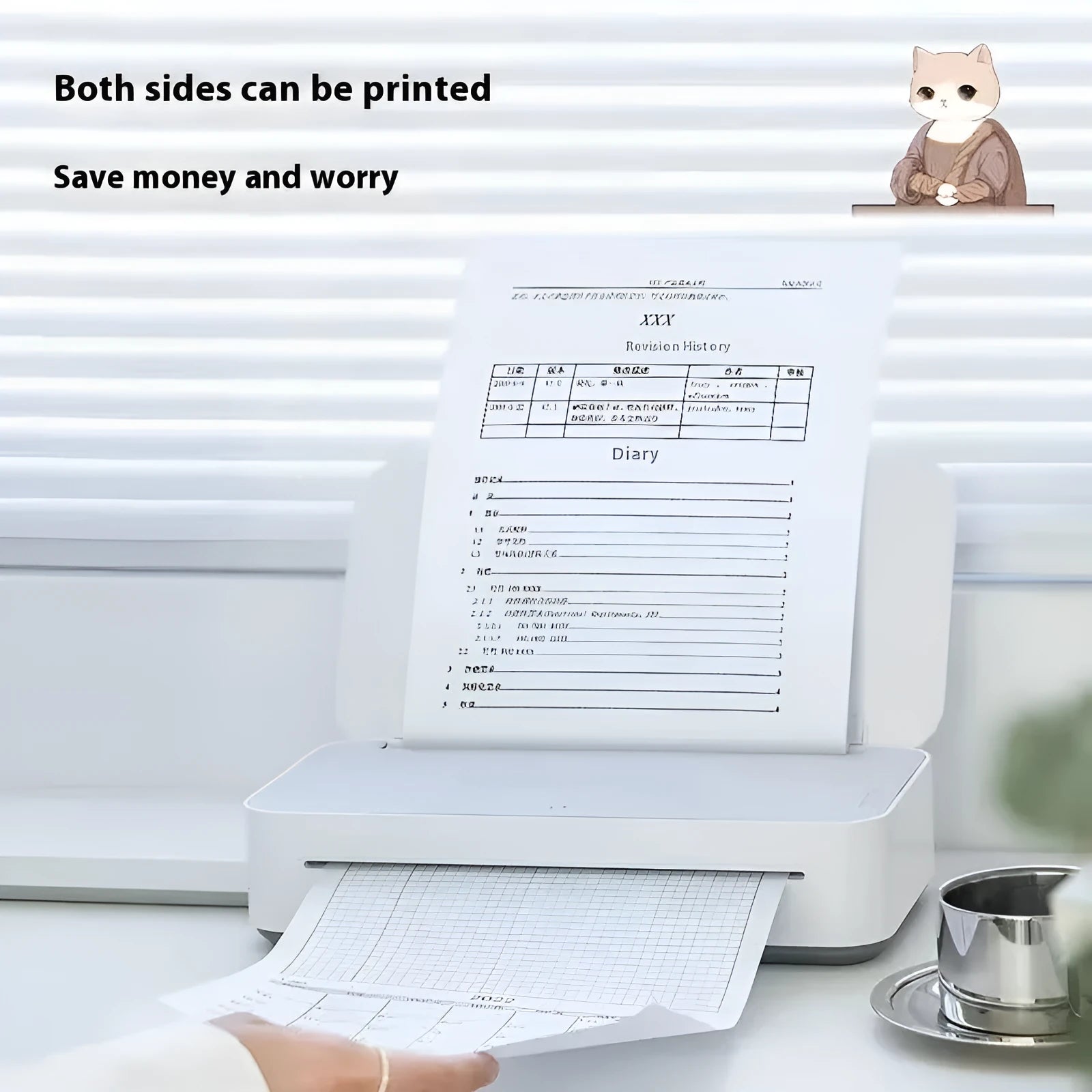 Small white plastic intelligent remote learning printer with a ribbon cartridge on a desk.