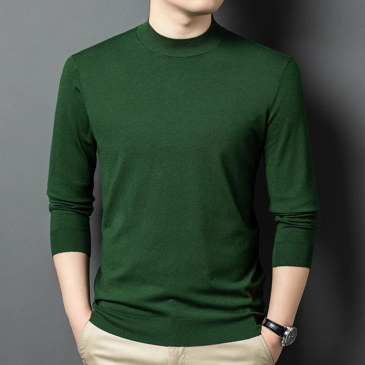 Men's round neck grey wool blend pullover sweater with long sleeves on a hanger.
