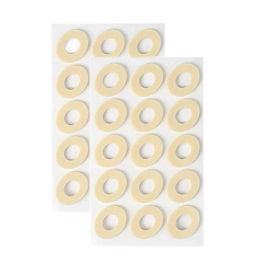 Women's protective toe pads set showing four different shapes: large oval, small oval, U-shaped and circular designs