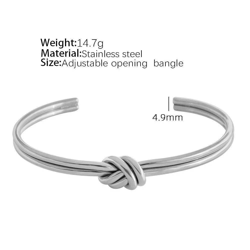 Women's adjustable knotted C-shaped open double-layer bracelet in gold or silver plated stainless steel.