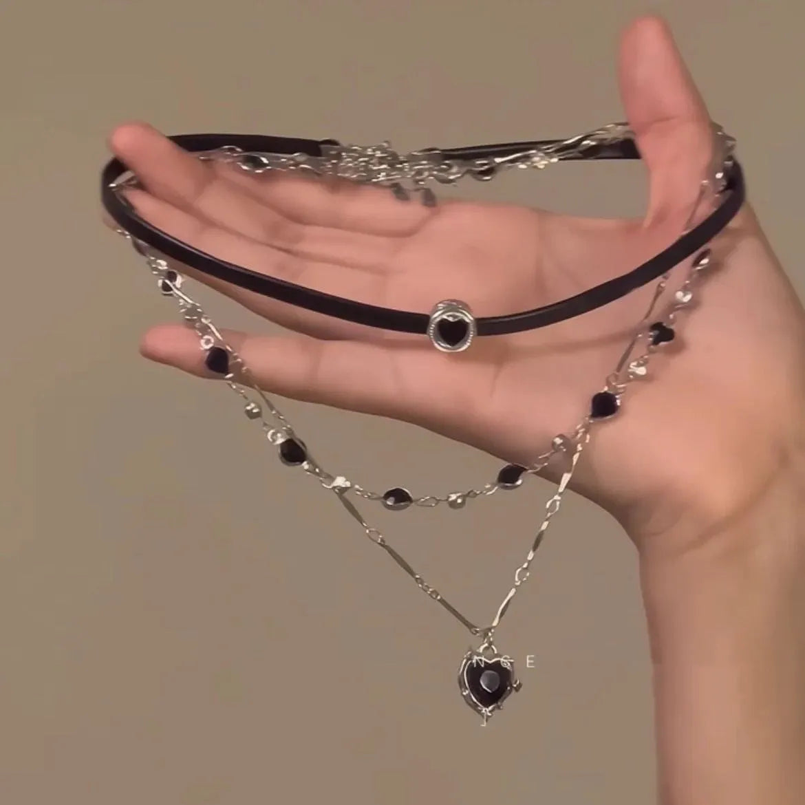 Women's adjustable multi-layer necklace with heart-shaped alloy pendants and crystal detailing