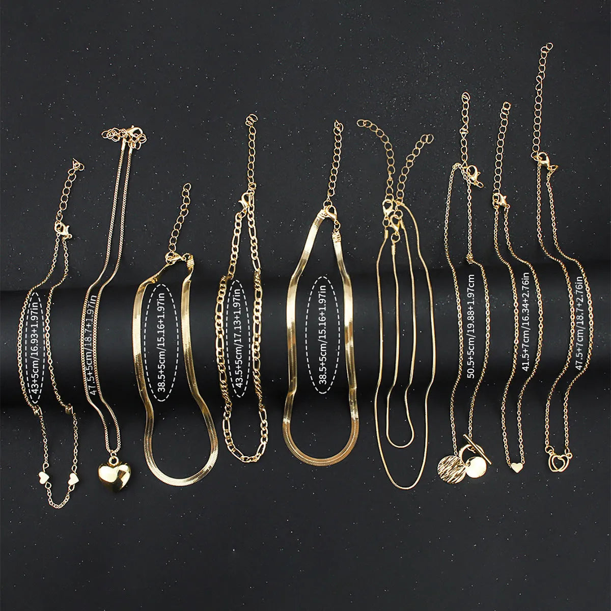 10-piece gold electroplated women's necklace set with snake bone chains and simple alloy pendants