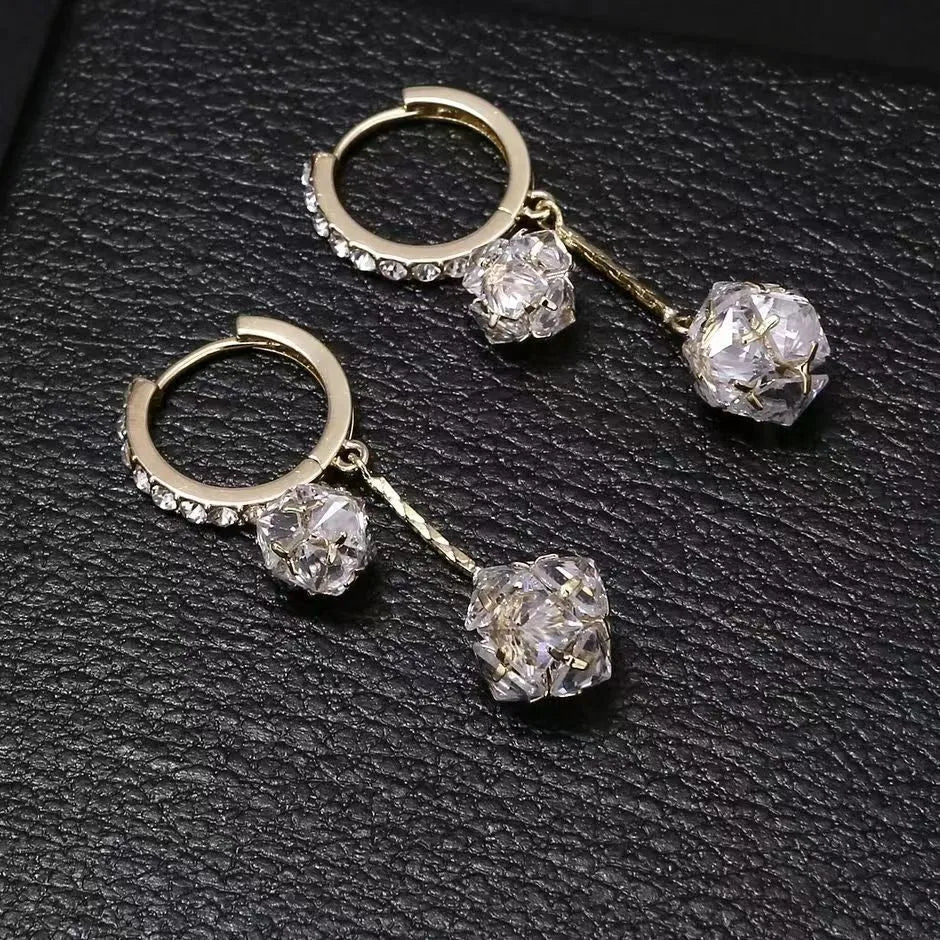 Silver confession balloon drop earrings with rhinestone ball and tassel pendant details and clip fastening