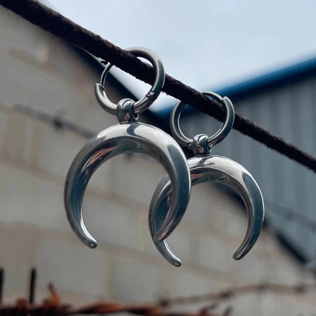 Alloy geometric hoop earrings with gothic moon design and silver electroplated finish