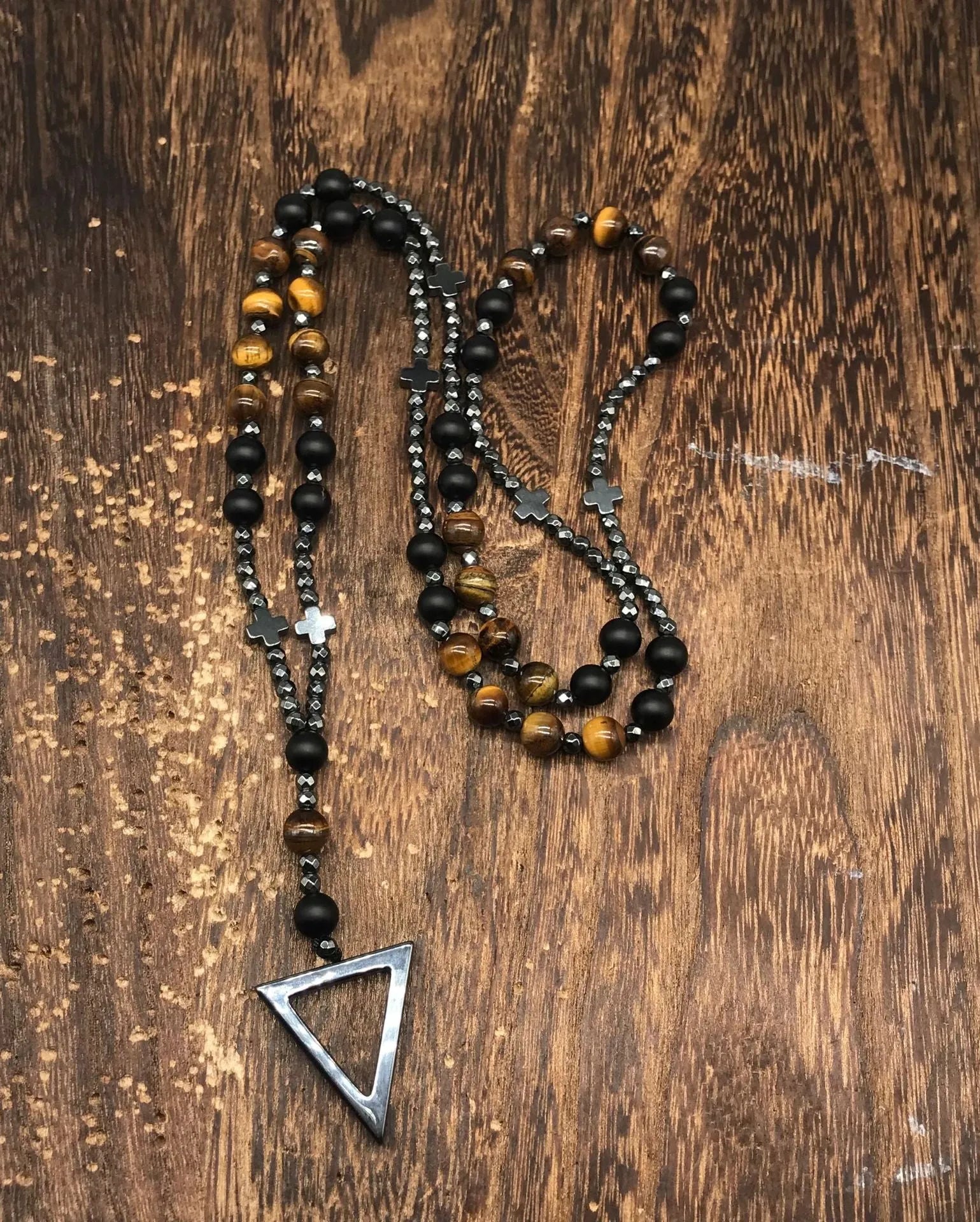 Men's stone cross pendant necklace on a ball bead chain with a safety lock clasp.