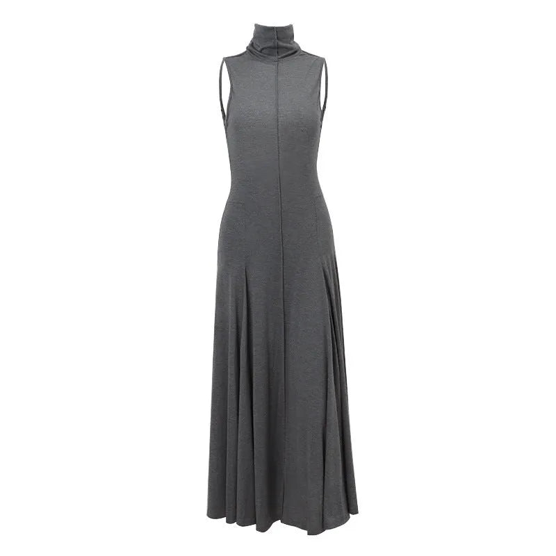 Grey slim-fit women's dress with half turtleneck collar, backless design, and high-waist silhouette