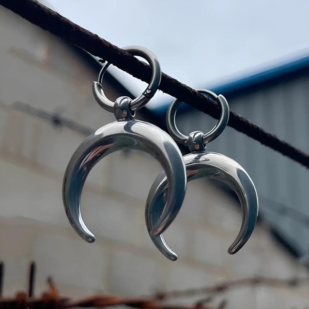 Alloy geometric hoop earrings with gothic moon design and silver electroplated finish