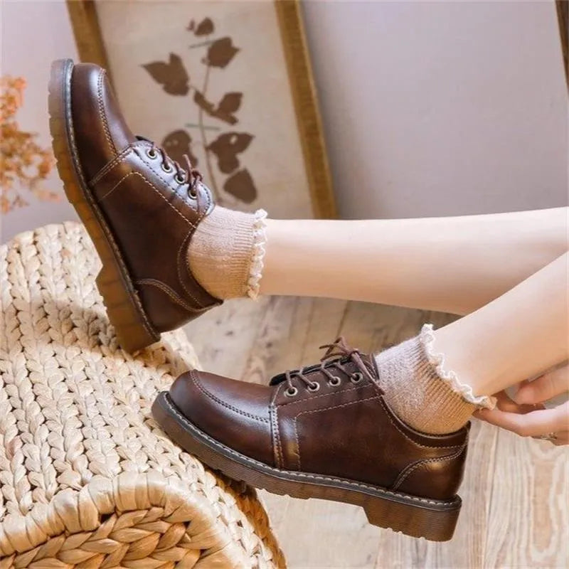 Women's black retro Mary Jane shoes with front lace-up and low square heel