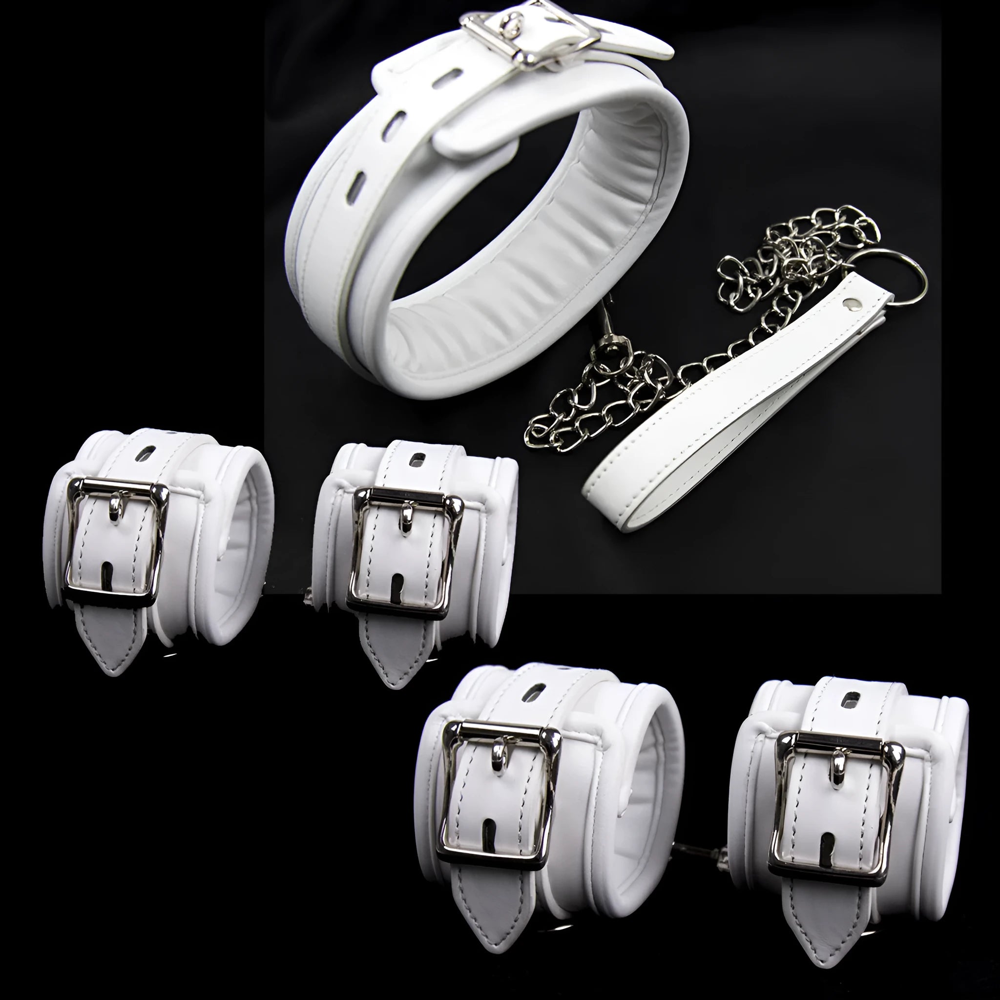 White PU sponge bondage restraint set showing handcuffs, foot cuffs and neck scarf for adjustable adult play