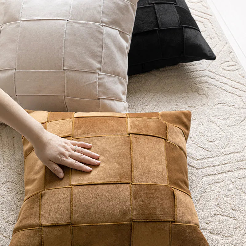 Chenille woven square pillow cushion in beige colour on a sofa
