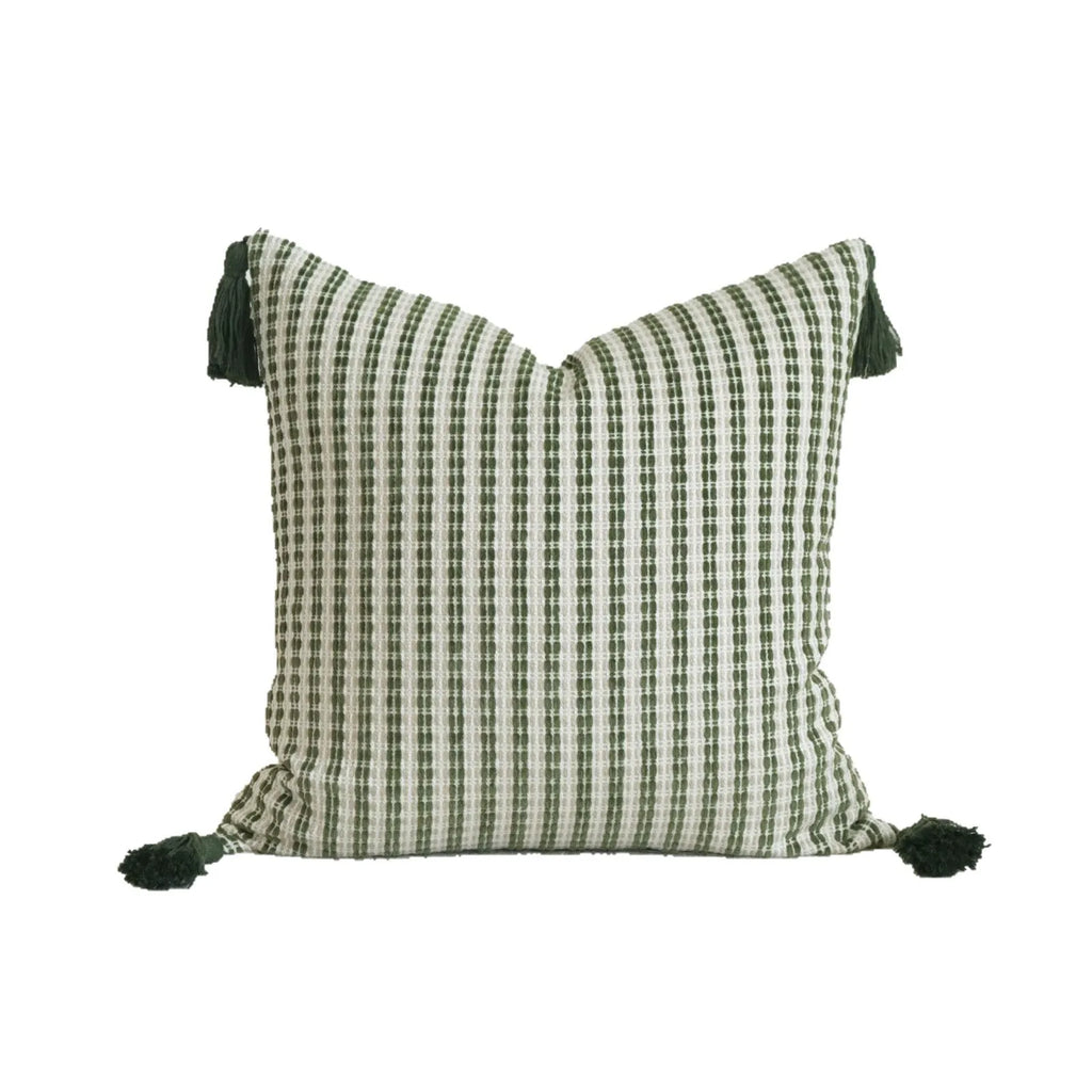 Green cotton and linen hotel sample pillow with botanical pattern and tassel trim