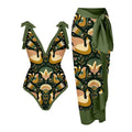 Women's solid colour one-piece swimsuit with spaghetti straps and a removable matching skirt.