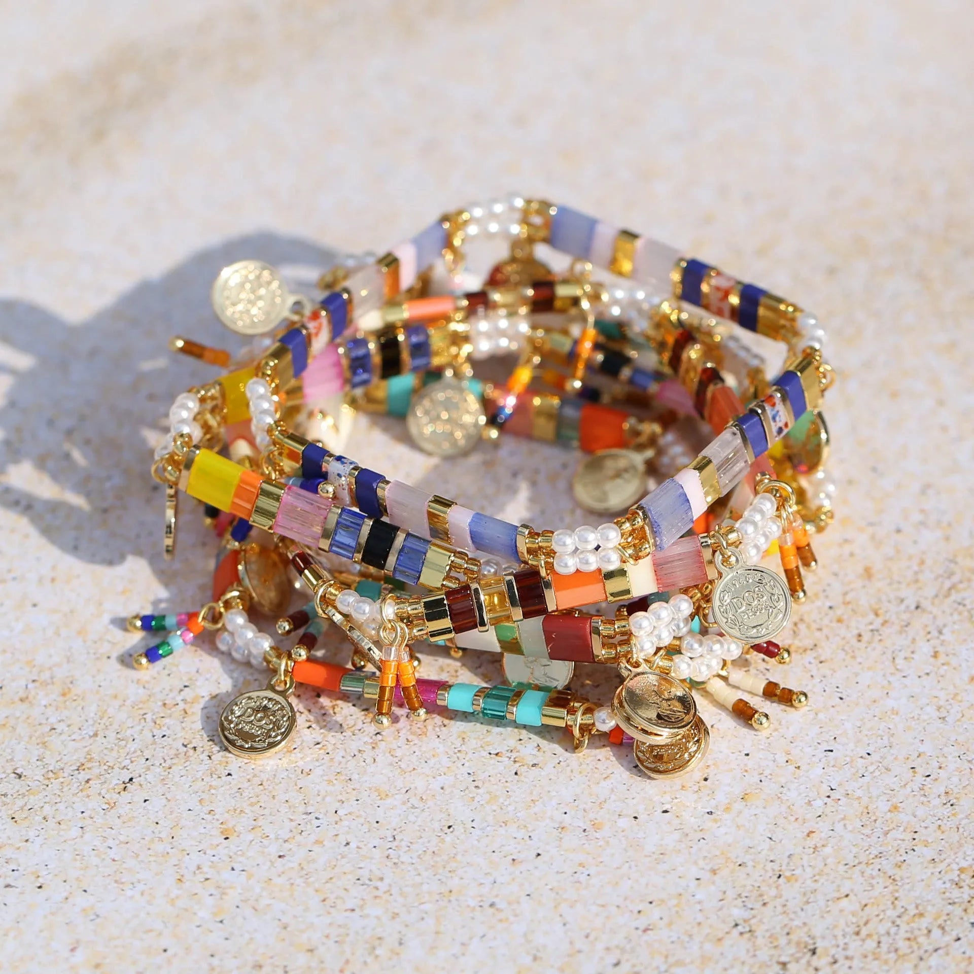 Women's imitation pearl beaded bracelet with glass coloured beads in six pearl lifting colour options