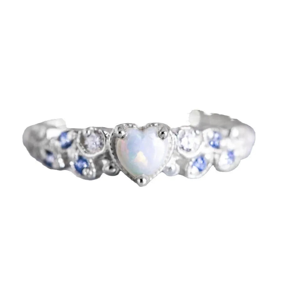 Women's heart-shaped ring with flower opal ocean design in peach colour on alloy band