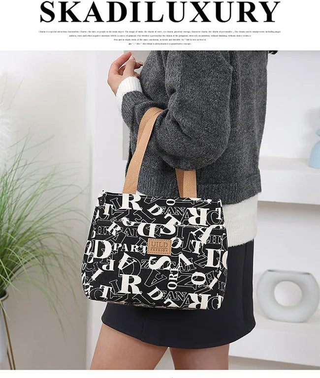 Women's printed canvas bag with aluminium frame in floral pattern and colour variations