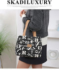Women's printed canvas bag with aluminium frame in floral pattern and colour variations