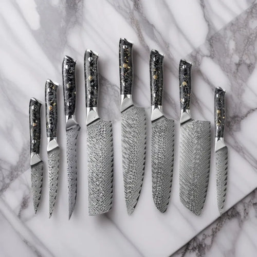 67-layer Damascus steel kitchen knife set with fishbone pattern showing eight different blade sizes and types