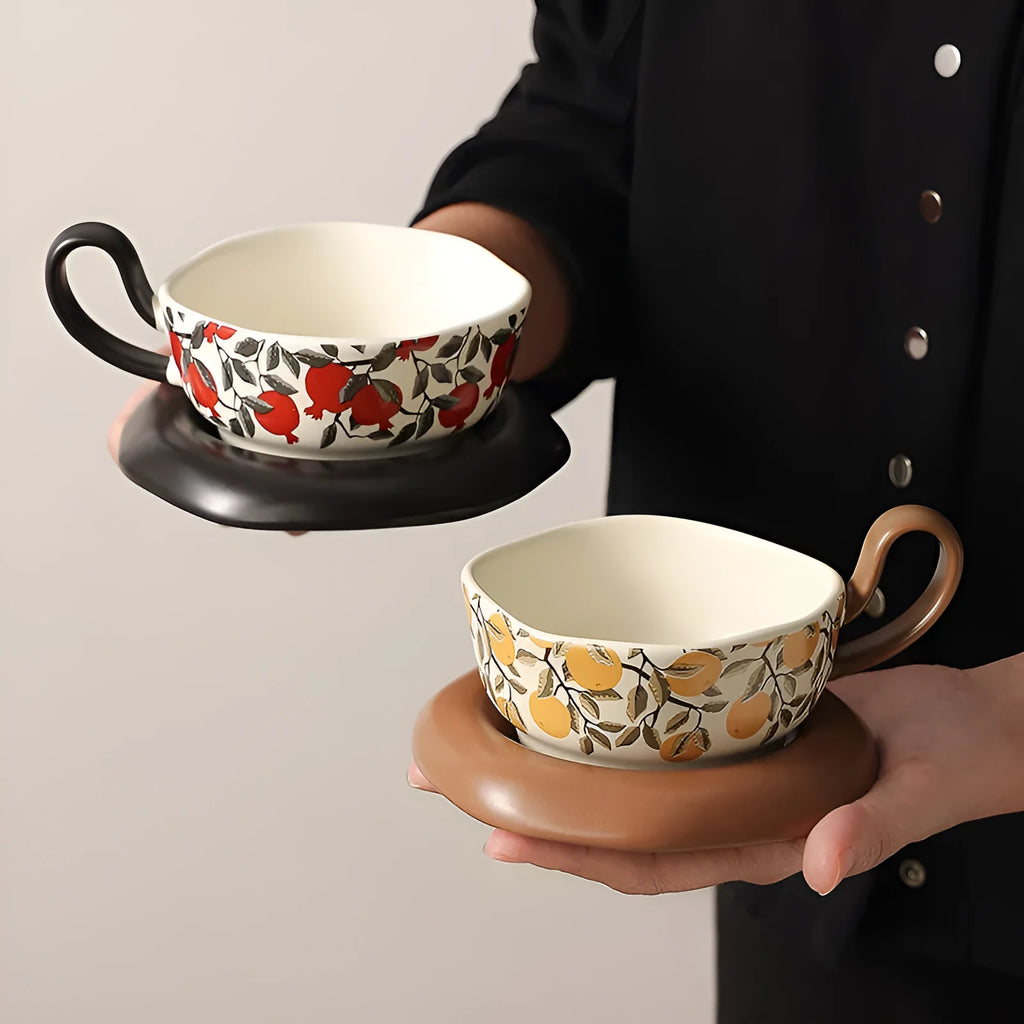 Antique style ceramic coffee cup and saucer set with medieval design in black or orange colour