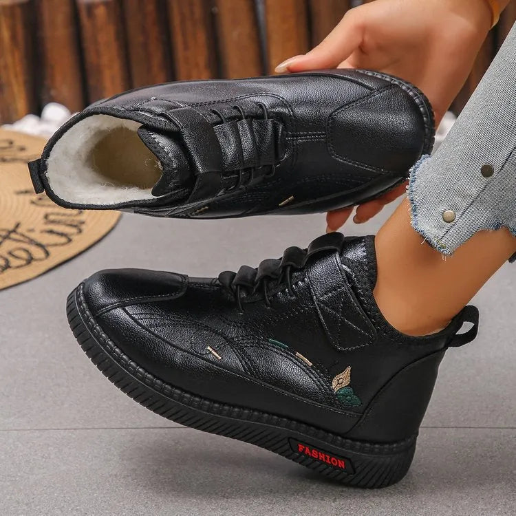 Women's black velvet slip-on shoes with rubber sole and low-cut design