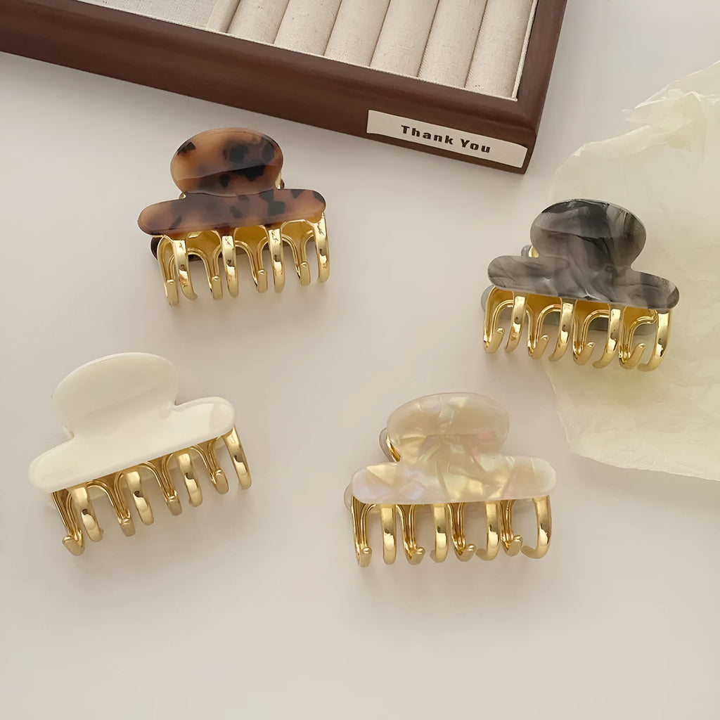 Women's retro acetate hair barrette with metal grip in leopard print colour option