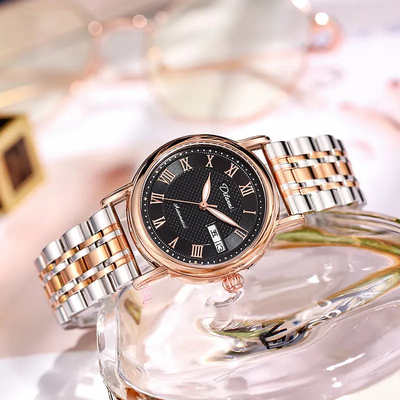 Women's automatic mechanical watch on wrist showing open case back with visible movement