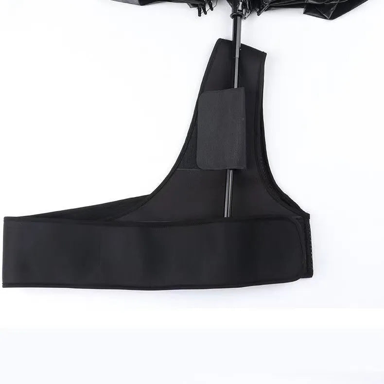Black portable umbrella holder with a shoulder strap designed for manual 10-bone umbrellas.