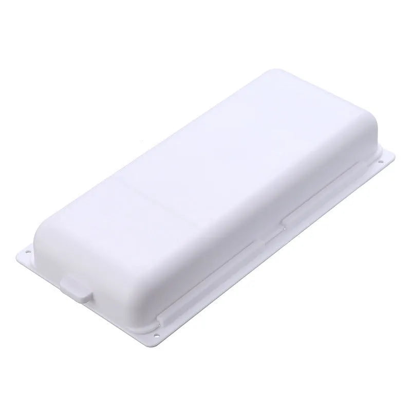 White plastic adhesive storage drawer with a covered grid design, shown mounted under a wooden desk.