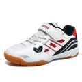 White and blue breathable PVC badminton shoes with a ribbed sole on a court surface.