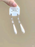Geometric heart-shaped alloy ear clips with rhinestone and star tassel decorations in gold tone finish