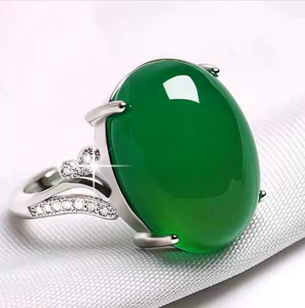 Geometric-style adjustable alloy ring in five colour options on a neutral background.