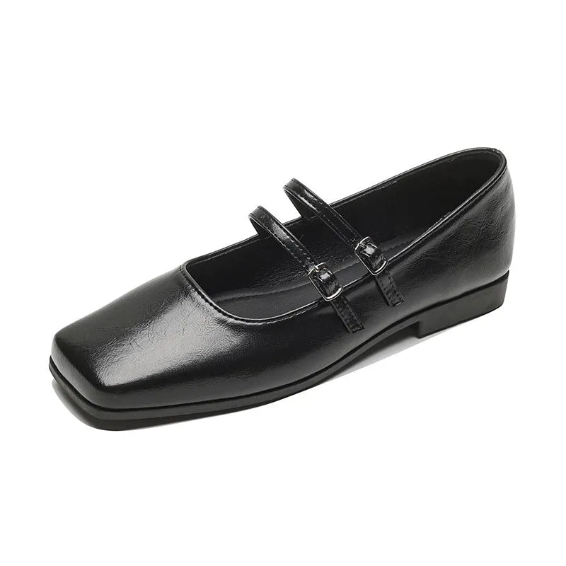 Women's silver ballet slipper pumps with a cross buckle strap, made from sheepskin leather with a flat heel.