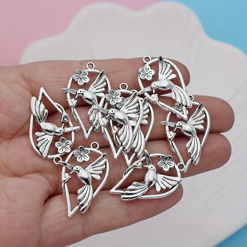 Alloy cuckoo bird pendant charm with electroplated gold tone finish for DIY jewellery making