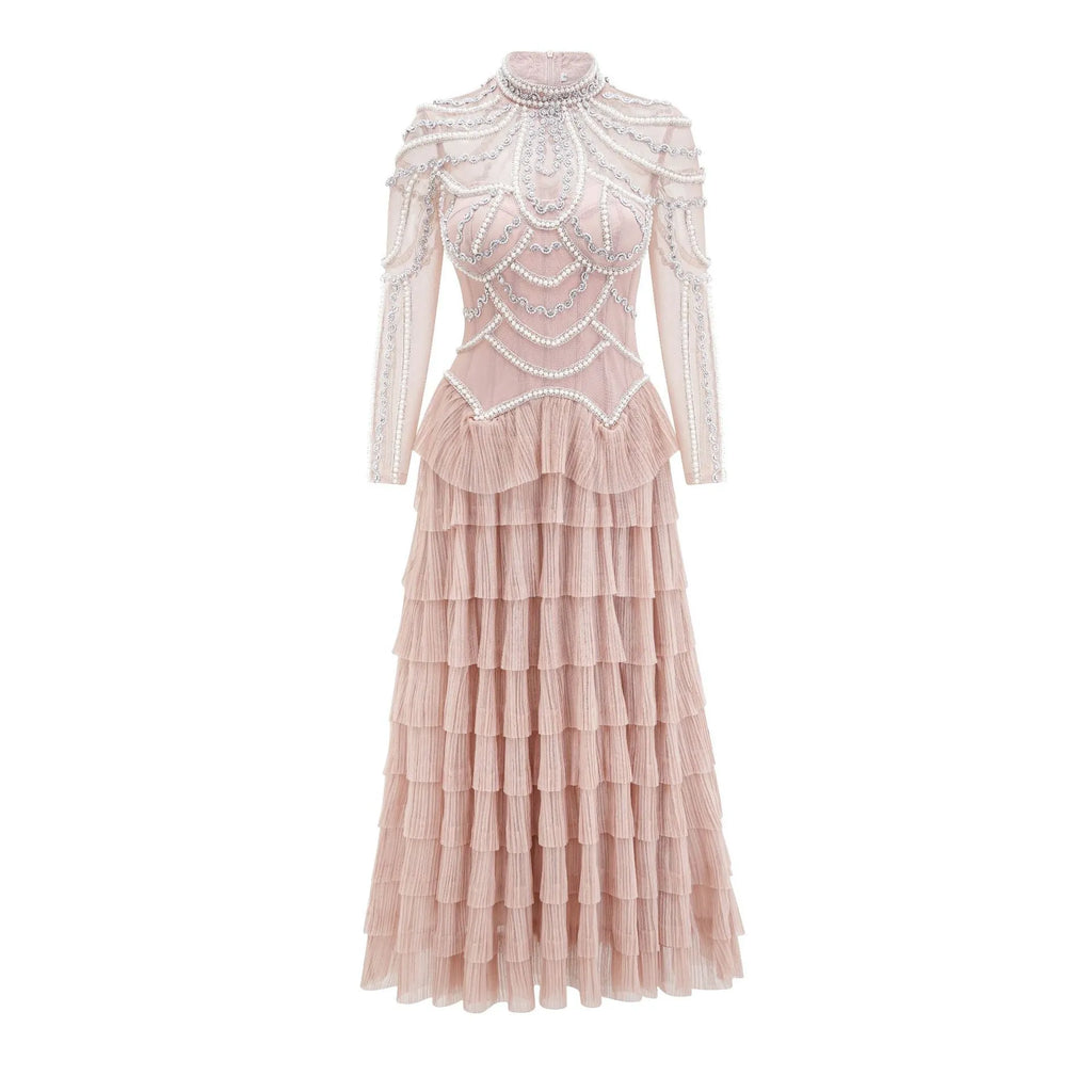 Black and pink women's long sleeve dress with beaded decoration on the front.