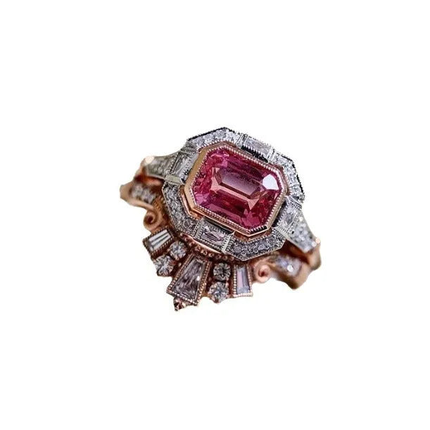 Women's retro style fashion ring with geometric design, rose gold finish and ruby detail