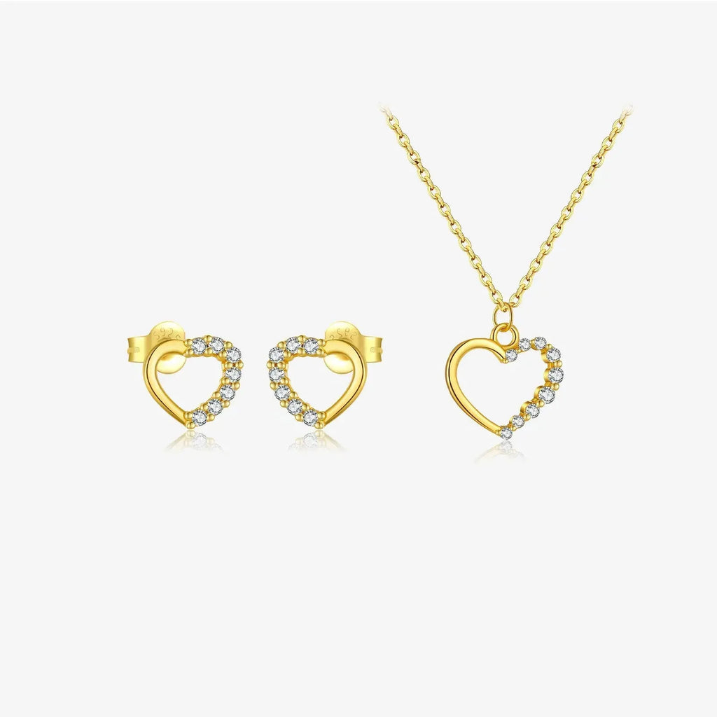 Close-up of a women's sterling silver hollow heart necklace with a circle detail, showing the white gold finish option.