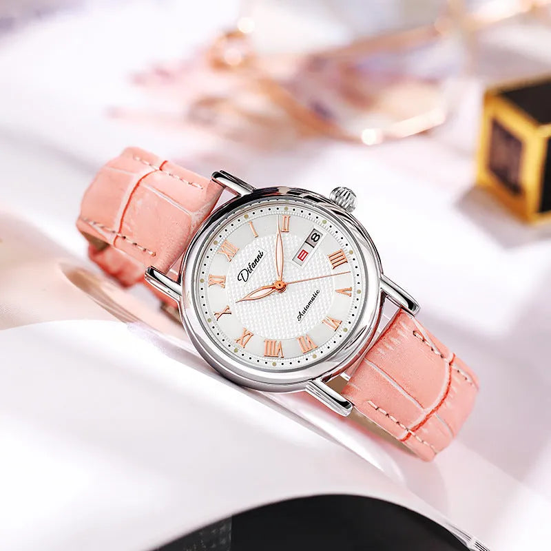 Women's automatic mechanical watch on wrist showing open case back with visible movement