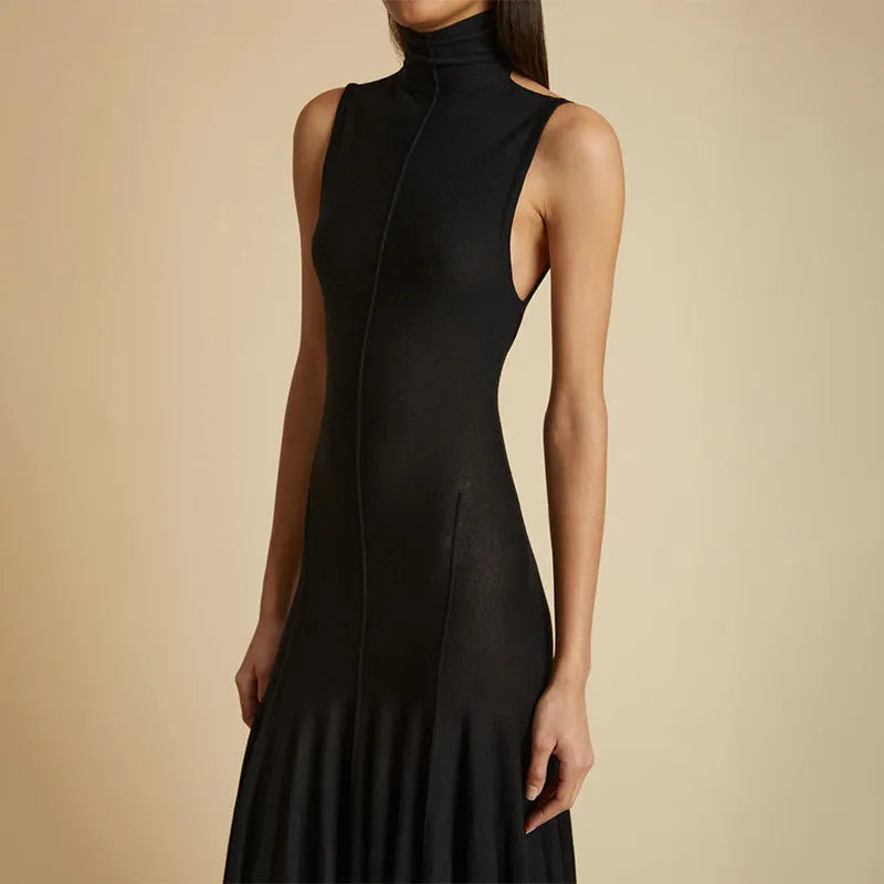 Grey slim-fit women's dress with half turtleneck collar, backless design, and high-waist silhouette