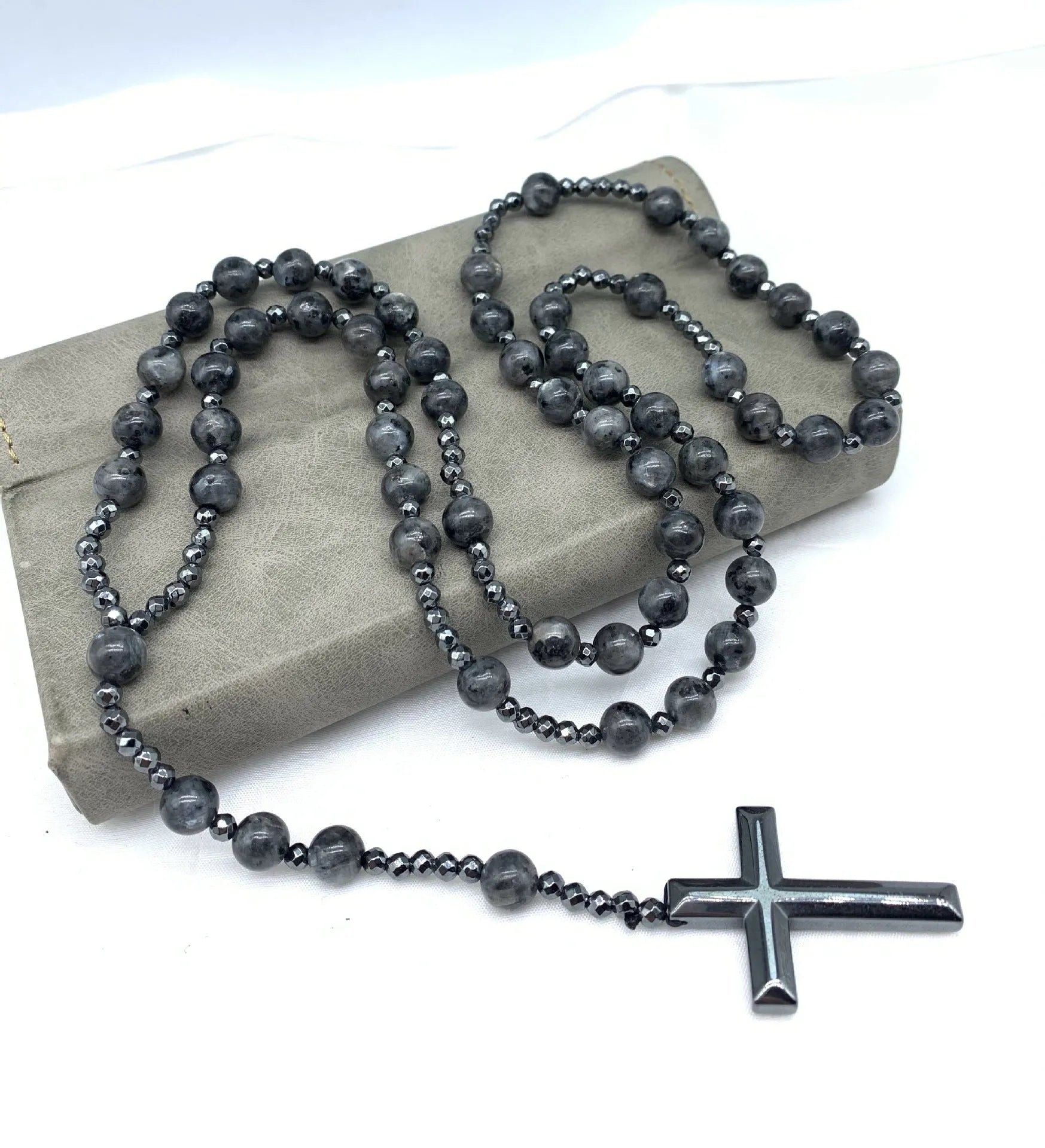 Men's stone cross pendant necklace on a ball bead chain with a safety lock clasp.