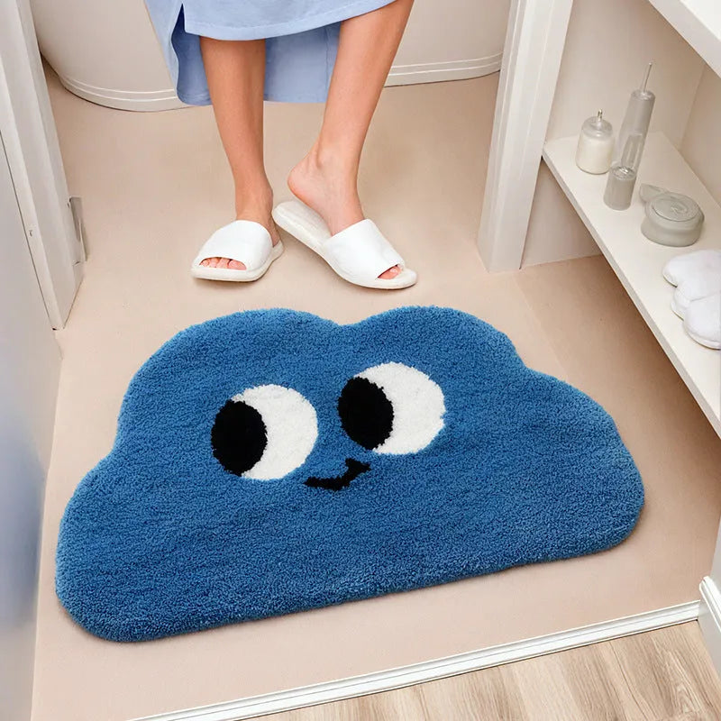 Colourful cartoon cloud bathroom mat with big eyes on a soft polyester pile.